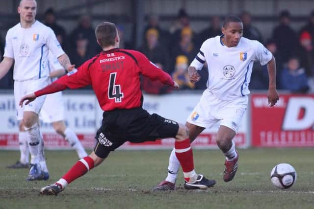 Jon D'Laryea playing for Mansfield Town