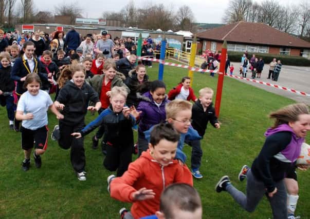 Pupils at Mansfield's Crescent Primary School are pictured setting off on their 1 mile run in aid of Sport Relief on Thursday.