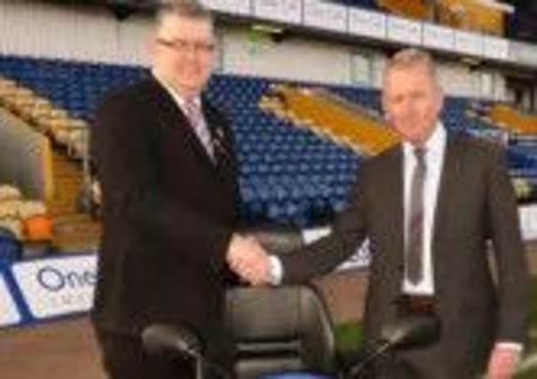 Mansfield Town's commerical manager Paul Nyland and Mansfield Mobility's Gary Hagan.