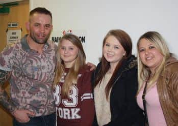 Neil Huntley with Phil Dawn's wife Jane and daughters.