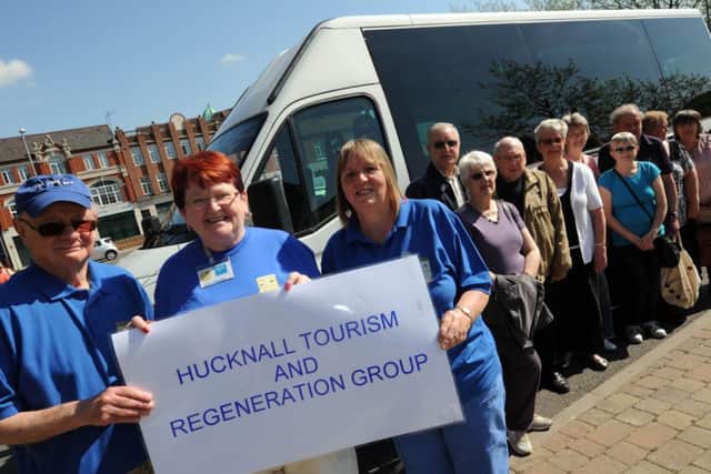free bus tour for Hucknall Tourism and Regeneration Group (HTRG). Pictured front l-r is Pat Richards tour guide, Sheila Robinson organiser and Kathy Williams escort.