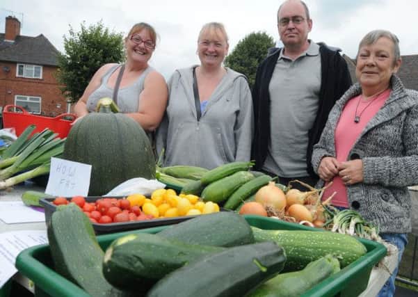 NHUD10-22662-4

Members of the Bulwell Community Garden pictured at the Bulwell Hall Estate Community Fun Day on Wednesday. Pictured from the left are; Jennifer Cannop, secretary, Lorna Duffy, Peter Brewin and Chris Chaplain