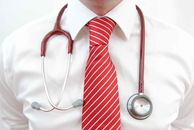 File photo dated 25/01/13 of a model posing with a stethoscope, as the Prime Minister announced that millions of patients are going to be able to see their family doctors outside of work hours thanks to a new fund to extend GP opening times. PRESS ASSOCIATION Photo. Issue date: Monday April 14, 2014. David Cameron said that more than 7.5 million people will be offered increased access to their GP services through extended opening times and new consultation methods using video-phone services, email and phone. See PA story HEALTH Hours. Photo credit should read: Andrew Matthews/PA Wire