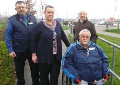 Wheelchair user Roland Hassall has won support in his fight to make a path close to his Mansfield home safer to use.