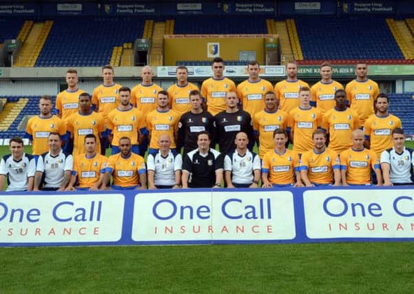 Mansfield Town FC are from left, back row, Lee Stevenson, Martin Riley, Ross Dyer, John Dempster, Ryan Tafazolli, Matt Rhead, John McCombe, Ritchie Sutton, Colin Daniel, from left, middle row, Louis Briscoe, Keiran Murtagh, Ollie Palmer, Lee Beevers, Alan Marriott, Ian Deakin, Ben Hutchinson, Sam Clucas, Anthony Howell and Paul Black, from left front row, Scott Merriman assistant kitman and groundsman, Michael Merriman groundsman and kitman, Chris Clements, Jake Speight, first team coach Richard Cooper, manager Paul Cox, assistant manager and club captain Adam Murray, James Jennings, Jamie McGuire, Lindon Meikle and Simon Murphy physio.