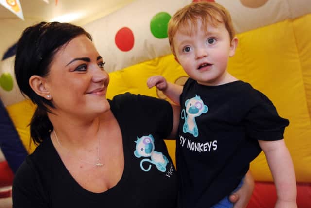 Open Day at Blidworth Community Leisure Centre for Messy Monkey. Pictured is organiser Victoria Staples with her son Frankie Murray 2.