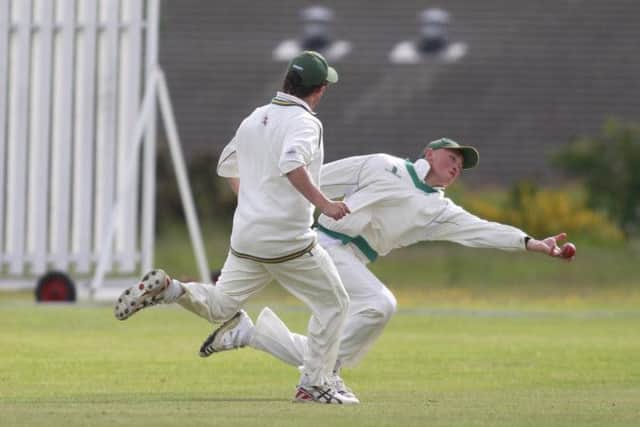 A tremendous catch by Glapwell's Daniel Bircumshaw off the bat of Clipstone's Josh Flowers  -Pic by:Richard Parkes