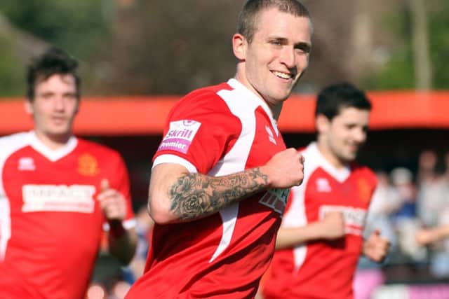 Josh Law races away after scoring Alfretons opening goal.