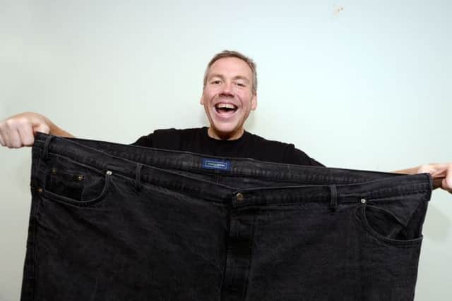 Stuart Eggleshaw who no longer needs his old trousers after losing 20 stone in weight.