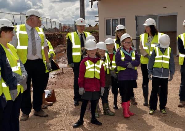 Stone laying ceremony for the new Beardall Street School, children from the school visited the new site