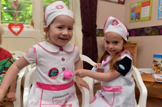 Children at Brooklyn Day Nursery took part in various activites to mark National Nurses Day. Children learn to use a stethoscope