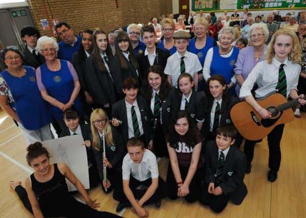 Holgate student visit Central Methodist Church in Hucknall to entertain pensioners with music and drama at annual over 73 Tea party run by Rotary Club.