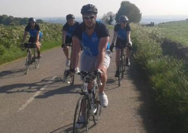 In training: the team get ready to pedal for Parkinson's
