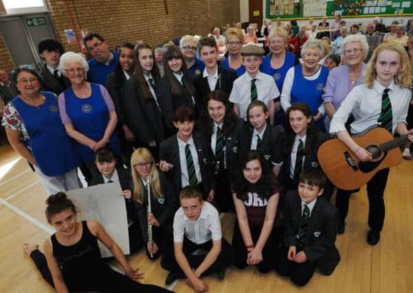 Holgate student visit Central Methodist Church in Hucknall to entertain pensioners with music and drama at annual over 73 Tea party run by Rotary Club.