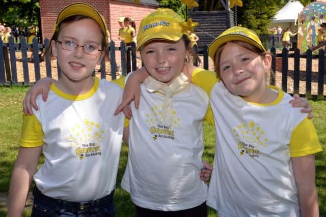 Over 3,000 Brownies and their leaders gathered at Wheelgate Theme Park for a big birthday party to celebrate the Brownie centenary. Pictured are Phoebe Heale, Frankie Gratton-Fisher and Betsy Meads from 
3rd Rainworth Brownies