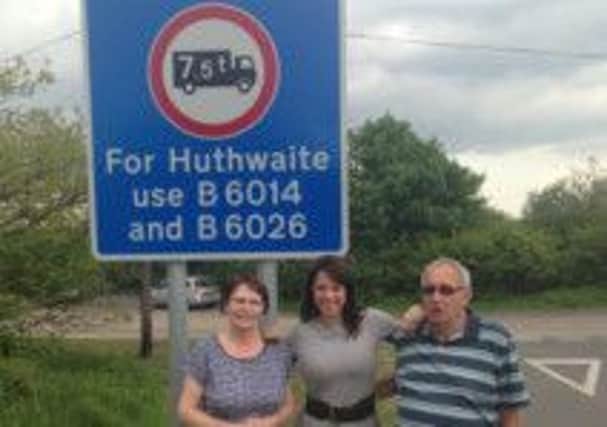 Huthwaite residents and Gloria De Piero celebrate wieght restrictions being imposed on Chesterfield Road in Huthwaite.