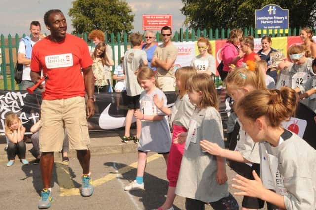 Linford Christie  at the Clare Rd Street Ahletics in Sutton