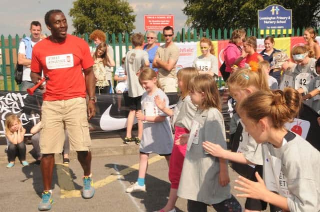 Linford Christie  at the Clare Rd Street Ahletics in Sutton