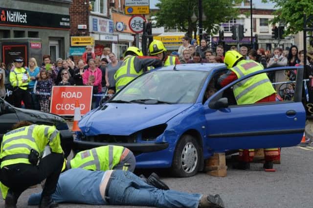 Police and Fire Service staged a fake road accident in Sutton town centre planned and funded by Ashfield Community Safety Partnership to raise awareness of the fatal four, particularly among young drivers.