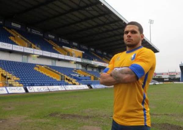 New Mansfield Town striker hopes to be given time to settle in.