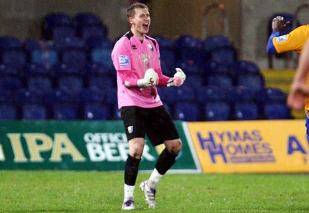 Mansfield Town goalkeeper Alan Marriott celebrates his goal against Wrexham. Picture by Dan Westwell.