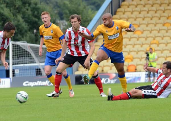 Mansfield Town in pre-season action against Sheffield United last summer.
