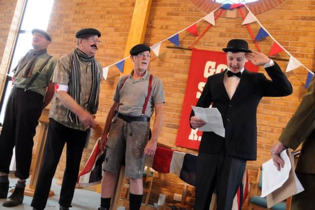 Church members put on a comedy sketch around enlisting.