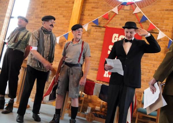 Church members put on a comedy sketch around enlisting.