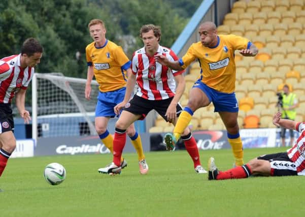 Mansfield Town in pre-season action against Sheffield United last summer.