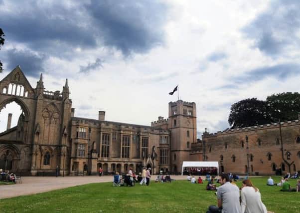 Visitors listen to the Mansfield Male Voice Choir at Newstead Abbey on Sunday.