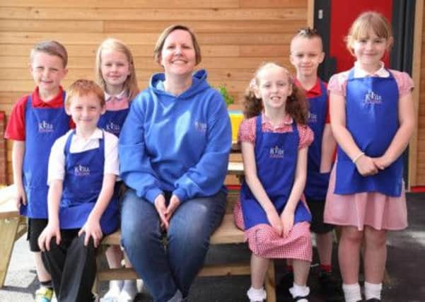 Tracey Cooke with Kidz Kitchen participants