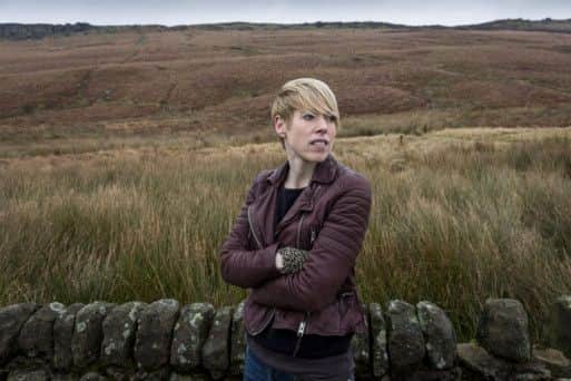 May0052298. Daily Telegraph. Helen Mort for DT Books. Picture shows poet Helen Mort, picture taken at Stanage Edge in Derbyshire where she climbs and walks. Picture date 04/01/2014