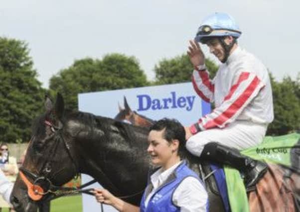 POWER PACKED -- Slade Power and jockey Wayne Lordan after their success in the big race of the day last Saturday, the July Cup at Newmarket. (PHOTO BY: Keith Heppell)