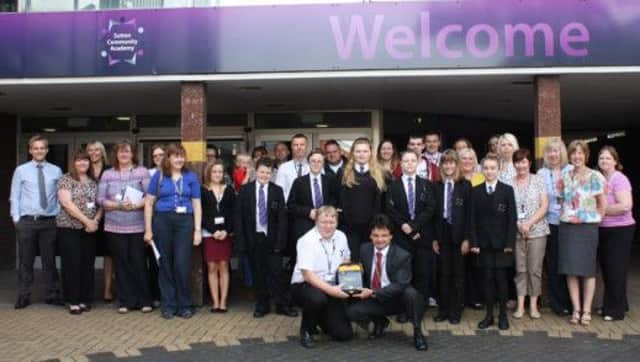 Staff and students from Sutton Community Academy joined with representatives from the East Midlands Ambulance Service and NatWest bank to present the recently purchased defibrillator machine to Academy Principal Simon Martin