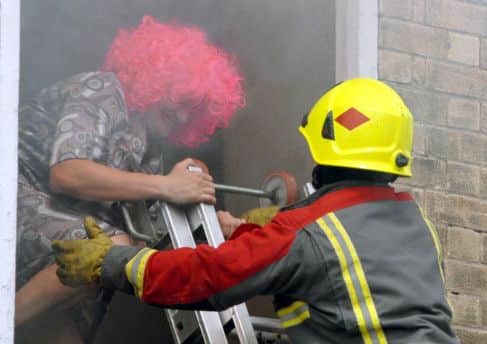 NMAC-Fire Station Open Day-8A demonstration of a rescue from a burning house