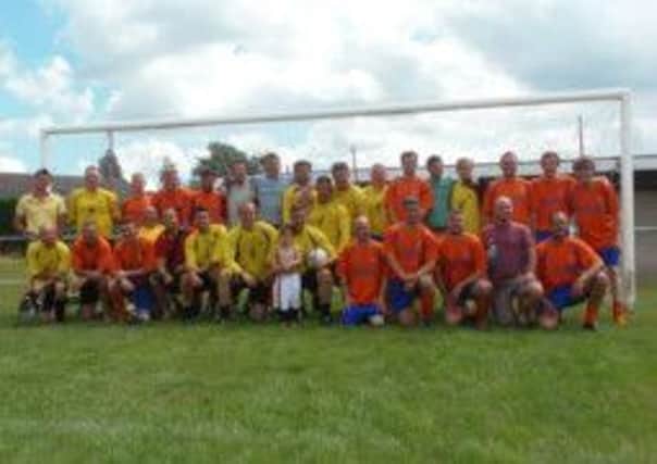 Sibling rivalry: Jamie and Richard Allan with fellow players at last years charity match that will this year support AMMF.