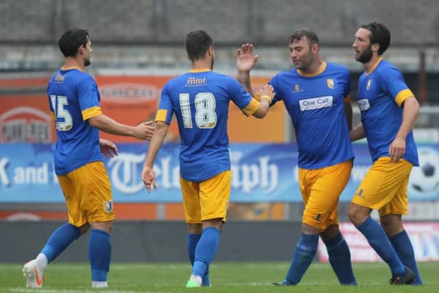 Matt Rhead is congratulated after scoring for the Stags -Pic by: Richard Parkes