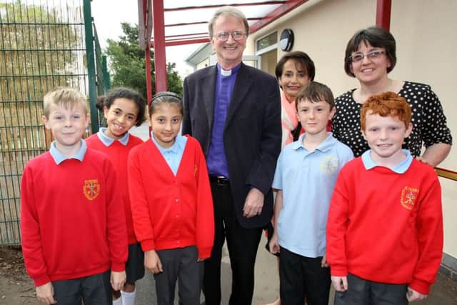 The Bishop of Sherwood Tony Porter opens a new class room block at St Peter's CE Primary School in Mansfield as part of their 40th celebrations at Bellamy Road. Also pictured are headteacher Pearl Day and chairman of governors Christine Bacon