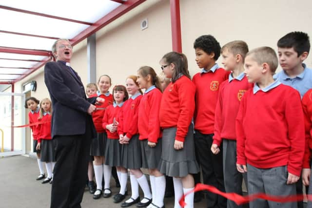 The Bishop of Sherwood Tony Porter opens a new class room block at St Peter's CE Primary School in Mansfield as partbof their 40th celebrations at Bellamy Road