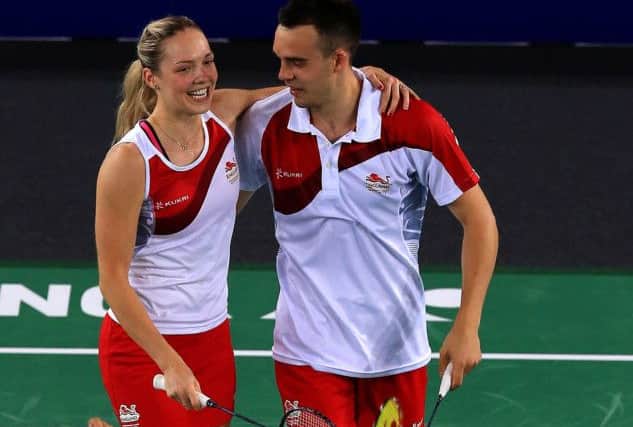 Gabrielle Adcock and Chris Adcock celebrate winning their game against Malaysia in the mixed doubles. Picture by Peter Byrne/PA Wire.