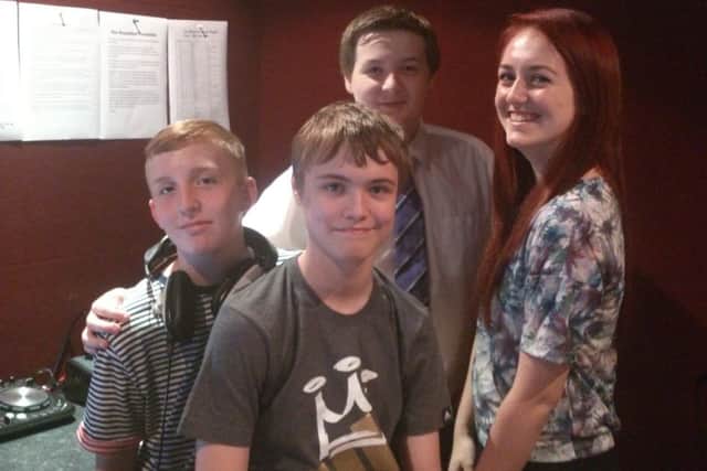 Members of the Takeover 106.9 team.