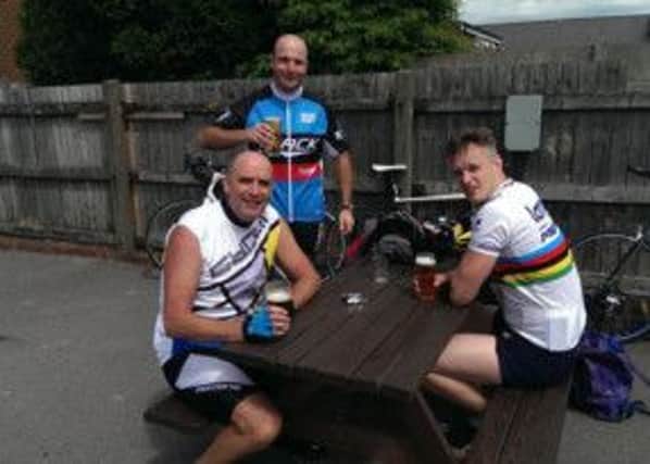 Members of Ashfield Rugby Club having a well-earned pint during training for their marathon cycle.