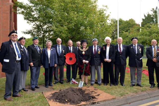 Tree planting to commemorate 40 years of Ashfield District Council and to mark the centenary of WW1, pictured is council chairman Coun Elizabeth Mays with members of the Royal British Legion
