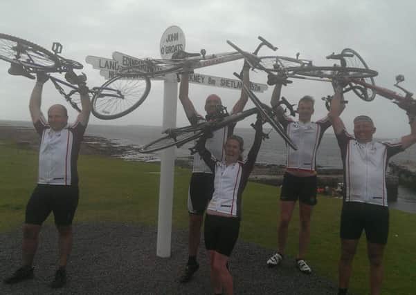 Members of Ashfield Rugby Club who cycled from Lands End to John O'Groats to raise £10,000 for First Point.