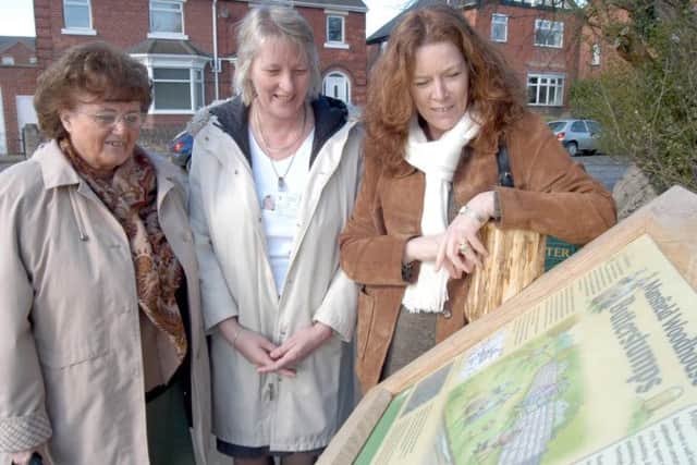 Neighbourhood Watch schemes across the Mansfield area get involved in a host of projects. Here, county councillor Joyce Bosnjak, right, is pictured with June Wass, left, Morvern Avenue Neighbourhood Watch Co-ordinator, and Sharon Cawar, centre, co-ordinator of the Mansfield Woodhouse Communuty Development Group for the unveiling of a new information board at the Butterstumps in Mansfield Woodhouse.