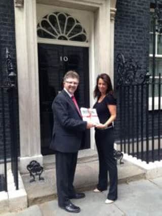 Coun Alan Rhodes, leader of Nottinghamshire County Council, and Gloria De Piero MP presented a petition to Downing Street in June calling for fairer funding for the authority.