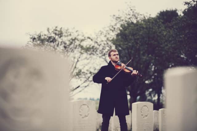 Sam Sweeney with Richard Howard's fiddle in Belgium