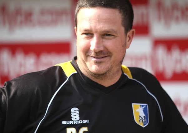All smiles for Mansfield boss Paul Cox -Pic by: Richard Parkes