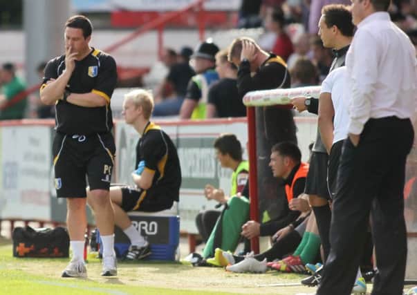 Mansfield manager Paul Cox ponders his next move as Stevenage score there second goal -Pic by: Richard Parkes