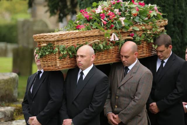 The funeral cortege arrives at Edensor for the funeral service. The funeral for the Dowager Duchess of Devonshire at Chatsworth House today October 2 2014. Over 600 staff and thousands of public lined the drive leading to Chatsworth House to pay their respects to the Dowager.
Tom Maddick / Rossparry.co.uk